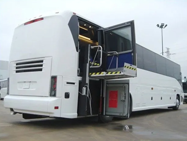 A large white bus available for rent in a Virginia parking lot